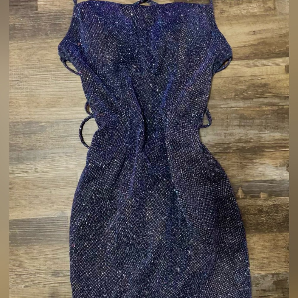 Homecoming dress, comes down to mid thigh but can be adjusted